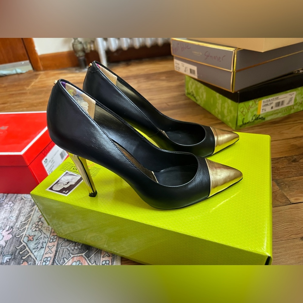Like new amazing condition Ted baker Gold and black heels size 8